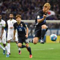 Keisuke Honda controls the ball after coming on as a substitute in Japan’s 2-1 World Cup qualifying win over Saudi Arabia at Saitama Stadium on Tuesday. Halilhodzic sends warning to frozen-out stars after Japan's win over Saudis