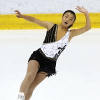 Kaori Sakamoto skates during the women\'s short program at the Japan Junior Championships on Saturday in Sapporo. Sakamoto leads the field with 67.45 points. | KYODO