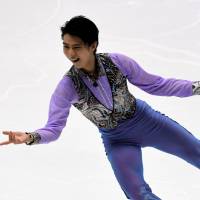 Yuzuru Hanyu performs his short program at the NHK Trophy on Friday in Sapporo. Hanyu received a top score of 103.89 points, putting him in firm control in the men\'s singles competition at Makomanai Arena. | AFP-JIJI