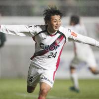 Fagiano Okayama\'s Shingo Akamine celebrates after scoring in the 92nd minute to put his team into the J1 promotion playoff final with a 2-1 win over Matsumoto Yamaga on Sunday. | KYODO