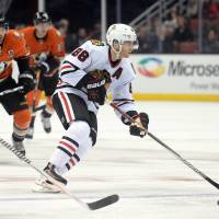 The Blackhawks’ Patrick Kane controls the puck on Friday in Anaheim, California. Chicago defeated the Ducks 3-2 in the annual Black Friday contest between the clubs. Blackhawks win annual Black Friday rivalry game