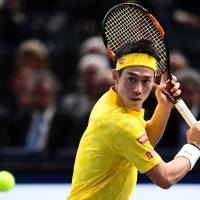Kei Nishikori prepares to return the ball during his match against Viktor Troicki on Wednesday at the Paris Masters. Nishikori won 6-2, 7-5. | AFP-JIJI