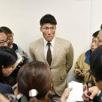 Yoshio Itoi speaks with members of the media on Monday in Osaka. | KYODO