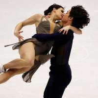 Tessa Virtue and Scott Moir perform their free dance during the NHK Trophy on Saturday in Sapporo. | REUTERS