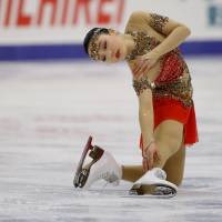 Wakaba Higuchi competes in the women\'s free skate on Saturday. Higuchi finished fourth. | REUTERS