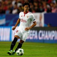 Sevilla\'s Hiroshi Kiyotake moves the ball against Dinamo Zagreb in Champions League action on Wednesday night. Sevilla won 4-0. REUTERS | REUTERS