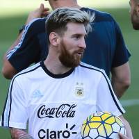 Argentina’s Lionel Messi takes part in a national team training session in Belo Horizonte, Brazil, on Tuesday. Brazil 'not scared' of returning Messi