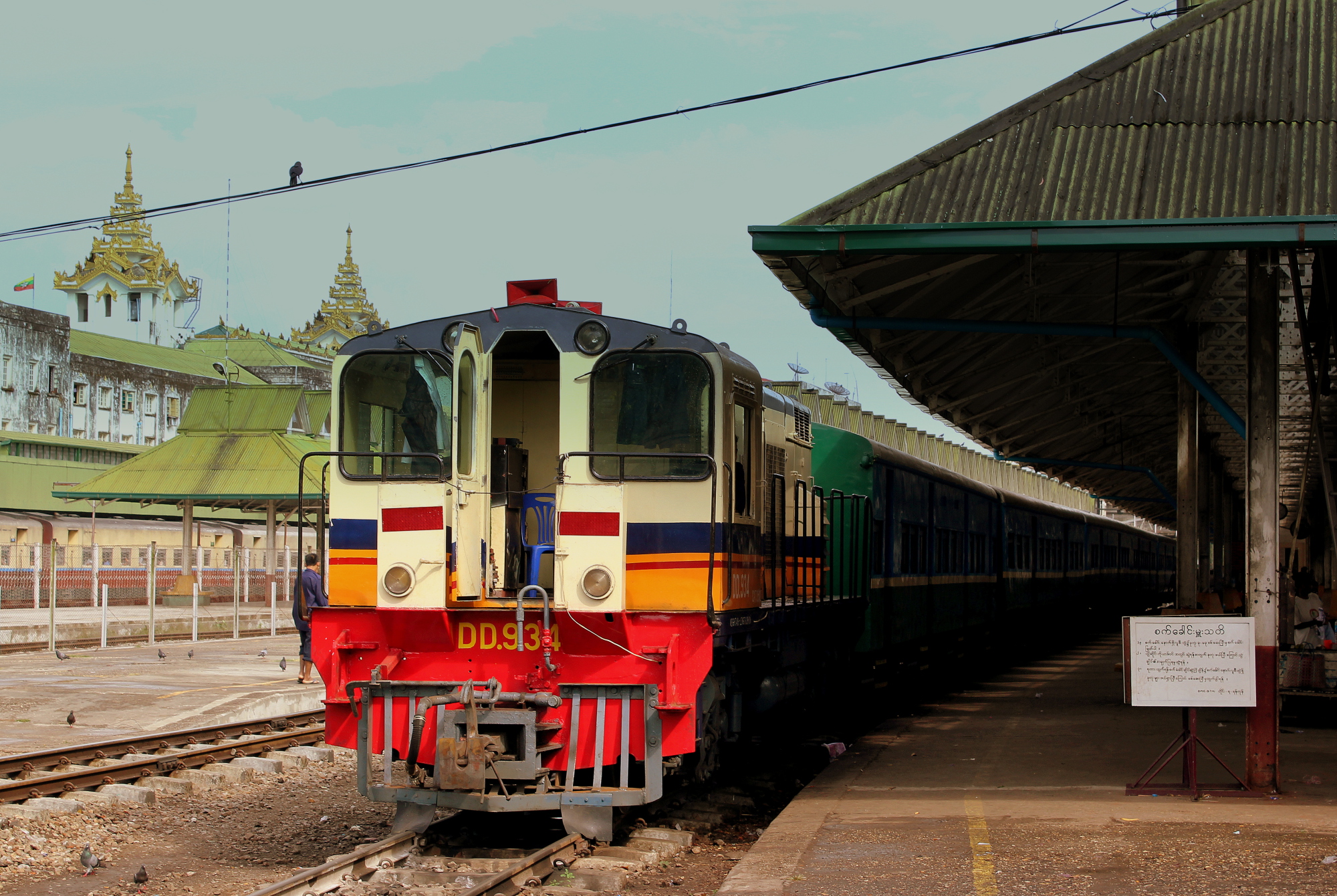 The Yangon Circular Railway currently is dilapidated and slow, but scenic. | CALFLIER001, VIA WIKIMEDIA COMMONS / CC BY-SA 2.0