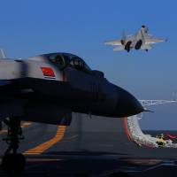 The Chinese military carries out a live-fire drill using the Liaoning aircraft carrier in the Bohai Sea in this undated picture. | REUTERS
