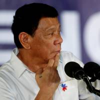 President Rodrigo Duterte speaks on Dec. 22 in front of housewives and mothers that participated in the anti-illegal drugs campaign of the provincial government and Duterte\'s war on drugs at Clark Freeport Zone in Pampanga, Philippines. | REUTERS