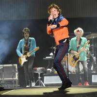 Mick Jagger performs Oct. 7 with Ron Wood (left) and Keith Richards of the Rolling Stones during their performance on day 1 of the 2016 Desert Trip music festival at Empire Polo Field in Indio, California. Jagger, the 73-year-old frontman of the Rolling Stones, was on hand Thursdayat a New York hospital when girlfriend, Melanie Hamrick, gave birth to the couple’s son. It's a boy: Great-grandfather Mick Jagger dad again at 73