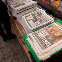 A newstand sells newspapers featuring the image of late singer George Michael in Manhattan, New York City, Monday. Tributes pour in for 'Last Christmas' great, gay rights activist George Michael