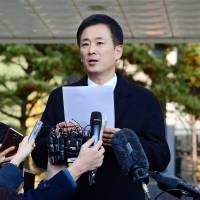 Yoo Yeong-ha speaks during a news conference at the Prosecutor\'s Office in Seoul on Nov. 15. | REUTERS