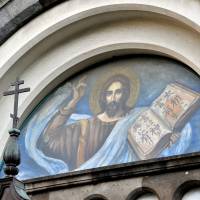 A wall painting at the Holy Resurrection Cathedral in Tokyo, commonly known as Nicolai-do, features Jesus Christ holding a book in Japanese. | YOSHIAKI MIURA