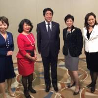 Prime Minister Shinzo Abe poses at the World Assembly for Women in Tokyo. The photo was published on Twitter by Tokyo Gov. Yuriko Koike. | AFP-JIJI