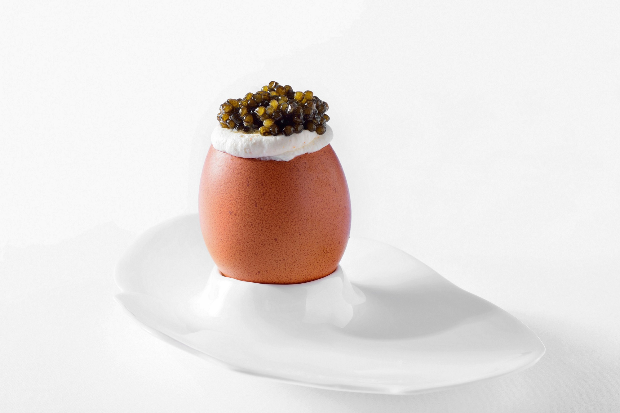 New pairings: JG Tokyo matches sake with French signatures such as egg caviar, soft scrambled eggs and vodka cream with Osetra caviar | KO SASAKI / BLOOMBERG