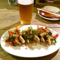 Home-made gy&#333;za (pot stickers) with pakchi (coriander) | ROBBIE SWINNERTON