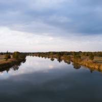 Golden hour: The Arakawa River reflects the sky at sunset. | LANCE  HENDERSTEIN