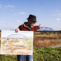Painted landscape: Toshiyuki Hakuno displays his watercolor of a bridge along the Arakawa River.  LANCE  HENDERSTEIN | LANCE  HENDERSTEIN