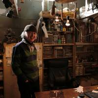 Artisan Ichiyoh Haga looms large in the workshop where he creates his tiny visionary landscapes. | KIT NAGAMURA