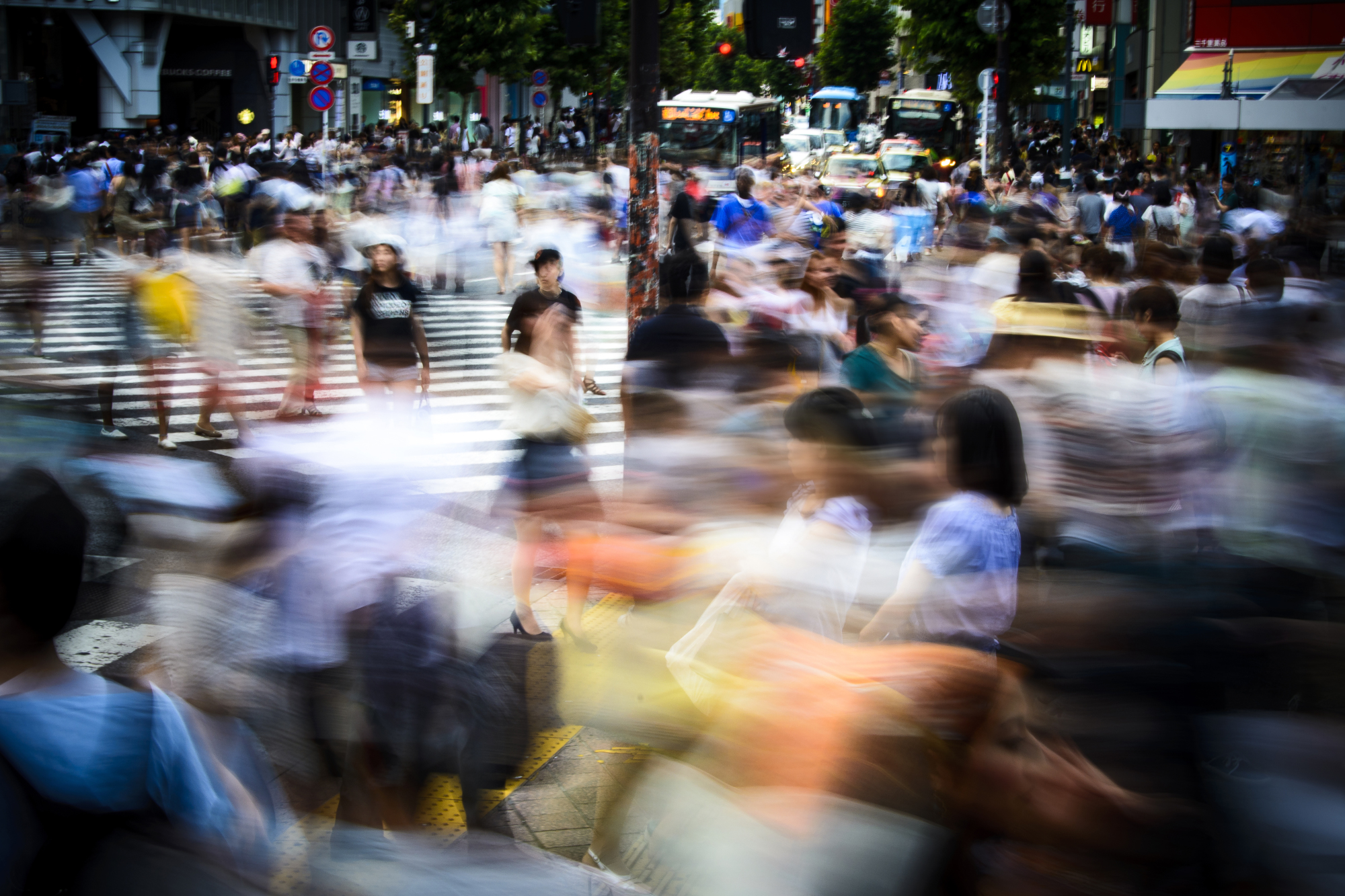 Pedestrians on a busy intersection in Tokyo | ISTOCK