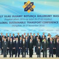 Political leaders and other representatives pose for a photo at the Global Sustainable Transport Conference in Ashgabat, Turkmenistan. | TURKMENISTAN EMBASSY