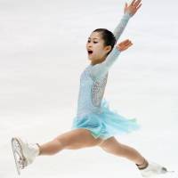 Satoko Miyahara performs her short program at the national championships on Saturday. She is in first place with 76.49 points. | KYODO