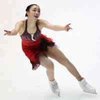 Rika Hongo skates in the women\'s short program at the national championships on Saturday. Hongo is in second place with 69.20 points. | KYODO