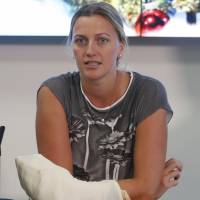 Two-time Wimbledon champion Petra Kvitova speaks to the media in Prague on Friday after being released from the hospital following surgery on her left hand. Kvitova was attacked by a knife-wielding intruder on Tuesday at her home in the town of Prostejov, Czech Republic. Kvitova on mend after attack