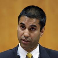 Federal Communications Commission (FCC) commissioner, Ajit Pai, presents his dissent during a 2013 Federal Communications Commission hearing at the FCC in Washington. President Donald Trump has picked Pai, a fierce critic of the Obama-era \"net neutrality\" rules, to be chief regulator of the nation\'s airwaves and internet connections.  | AP