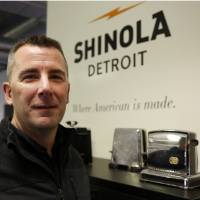 Shinola CEO Tom Lewand is seen at the watch factory on Jan. 4 in Detroit. Shinola, a young American company, is trying to make its mark by reinventing an iconic brand and selling products made in the USA, like bicycles and watches, manufactured in the industrial wastelands of Detroit. | AFP-JIJI