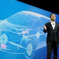 Carlos Ghosn, chairman and CEO of Nissan, speaks during a keynote address at the 2017 CES in Las Vegas on Thursday. Nissan ending joint development of luxury cars with Daimler