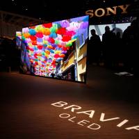 Sony Bravia OLED televisions are displayed during a Sony news conference at the 2017 CES in Las Vegas on Wednesday. Sony, Samsung TVs wow CES crowds with new screen technologies