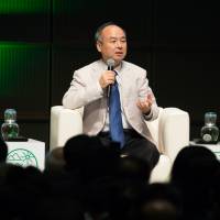 Masayoshi Son, chairman and chief executive officer of SoftBank Group Corp., speaks during a symposium in Tokyo on Sept. 9. | BLOOMBERG