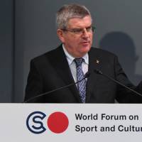 International Olympic Committee President Thomas Bach delivers a speech during the World Forum on Sport and Culture in Tokyo on Oct. 20. | OFFICE OF WORLD FORUM ON SPORT AND CULTURE