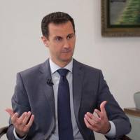 Bashar Assad | SANA / VIA REUTERS