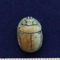 An Egyptian pharaonic scarab is pictured at one of the newly discovered ancient Egyptian cemeteries in Upper Egypt on Wednesday. | MINISTRY OF ANTIQUITIES / VIA REUTERS