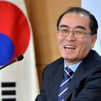 Thae Yong Ho, the former North Korean deputy ambassador to the United Kingdom, reacts during a news conference in Seoul on Dec. 27. | NEWS1 / VIA REUTERS