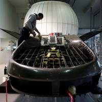 An employee works on a prototype of the Cormorant, a passenger-carrying drone, at Urban Aeronautics\' workshop in Yavne, Israel, on Dec. 22. | REUTERS