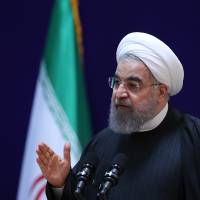 This handout picture provided by the office of Iranian President Hassan Rouhani shows him speaking at a conference in Tehran on Saturday. Iran's Rouhani to Trump: 'Not the time to build walls'