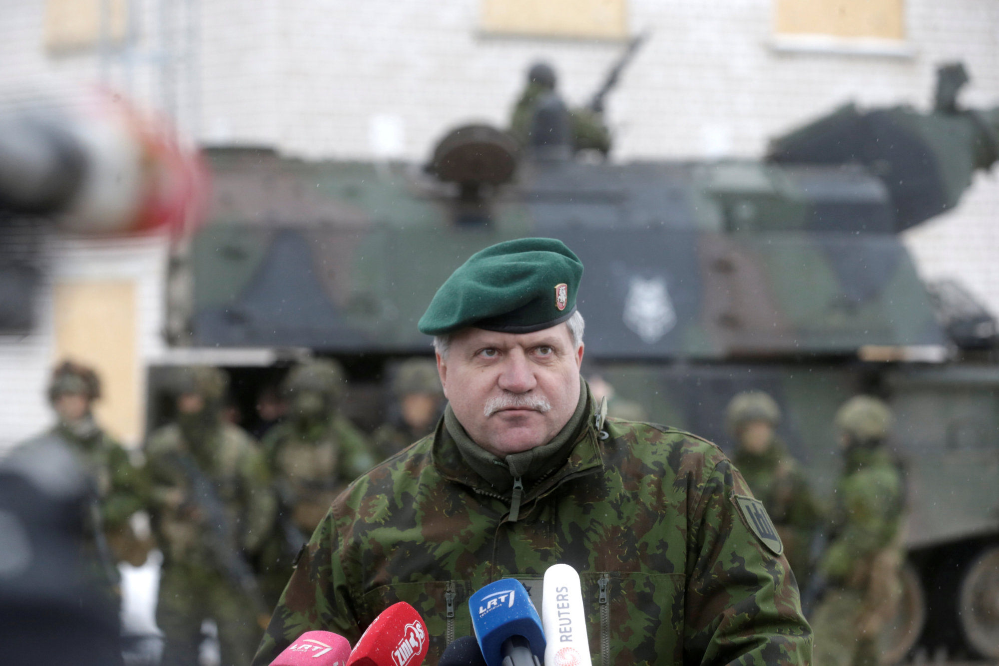 Chief of Defence of Lithuania, Jonas Vytautas Zukas, speaks to media during 12 NATO nations exercise in urban warfare during Iron Sword exercise in the mock town near Pabrade, Lithuania, Dec. 2. | REUTERS