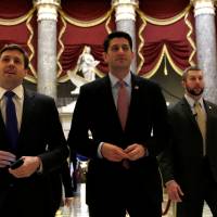 U.S. House Speaker Paul Ryan walks to the House Chamber to vote on Obamacare repeal in the District of Columbia on Friday. | REUTERS