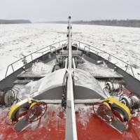 A Hungarian icebreaker navigates through ice floes on the river Danube near the village of Dalj, eastern Croatia, Tuesday. Hungary sent two icebreakers to its southern neighbors to make way for cargo vessels on the lower section of the border river between Serbia and Croatia. | EDVARD MOLNAR / MTI VIA AP