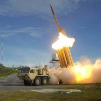 A Terminal High Altitude Area Defense (THAAD) interceptor is launched during a successful intercept test, in this undated handout photo. | REUTERS