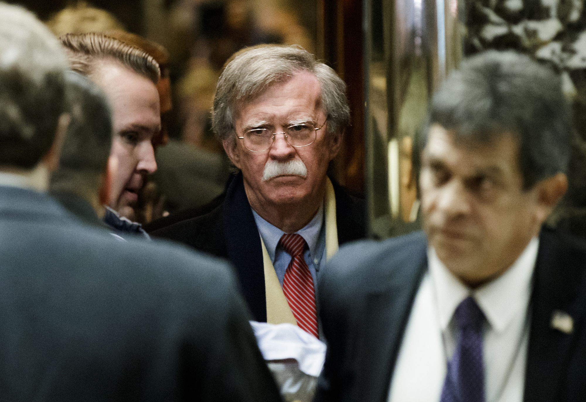 John Bolton, an adviser to President-elect Donald Trump and former ambassador to the United Nations, stands in the elevator of Trump Tower in New York on Dec. 2. | BLOOMBERG