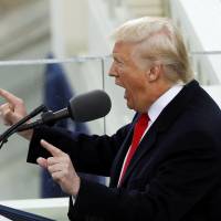 U.S. President Donald Trump speaks after taking the oath of office during his inauguration at the U.S. Capitol in Washington Friday. | REUTERS