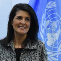 Newly appointed U.S. Ambassador to the United Nations Nikki Haley presents her credentials to U.N. Secretary-General Antonio Guterres at the body\'s headquarters in New York on Friday. | REUTERS