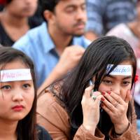 Activists in Bangalore on Saturday take part in a nationwide \"I Will Go Out\" march calling for safe access for women and marginalized communities in public spaces across India. | AFP-JIJI
