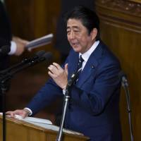 Prime Minister Shinzo Abe delivers his annual policy speech during a plenary session of the Lower House on Jan. 20. | BLOOMBERG