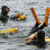 ‘Ama’ divers release abalone spats in Shima, Mie Prefecture, in April. 'Ama' diving culture recommended for inclusion on Japan cultural asset list